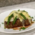 steak oscar with hollandaise sauce and crab